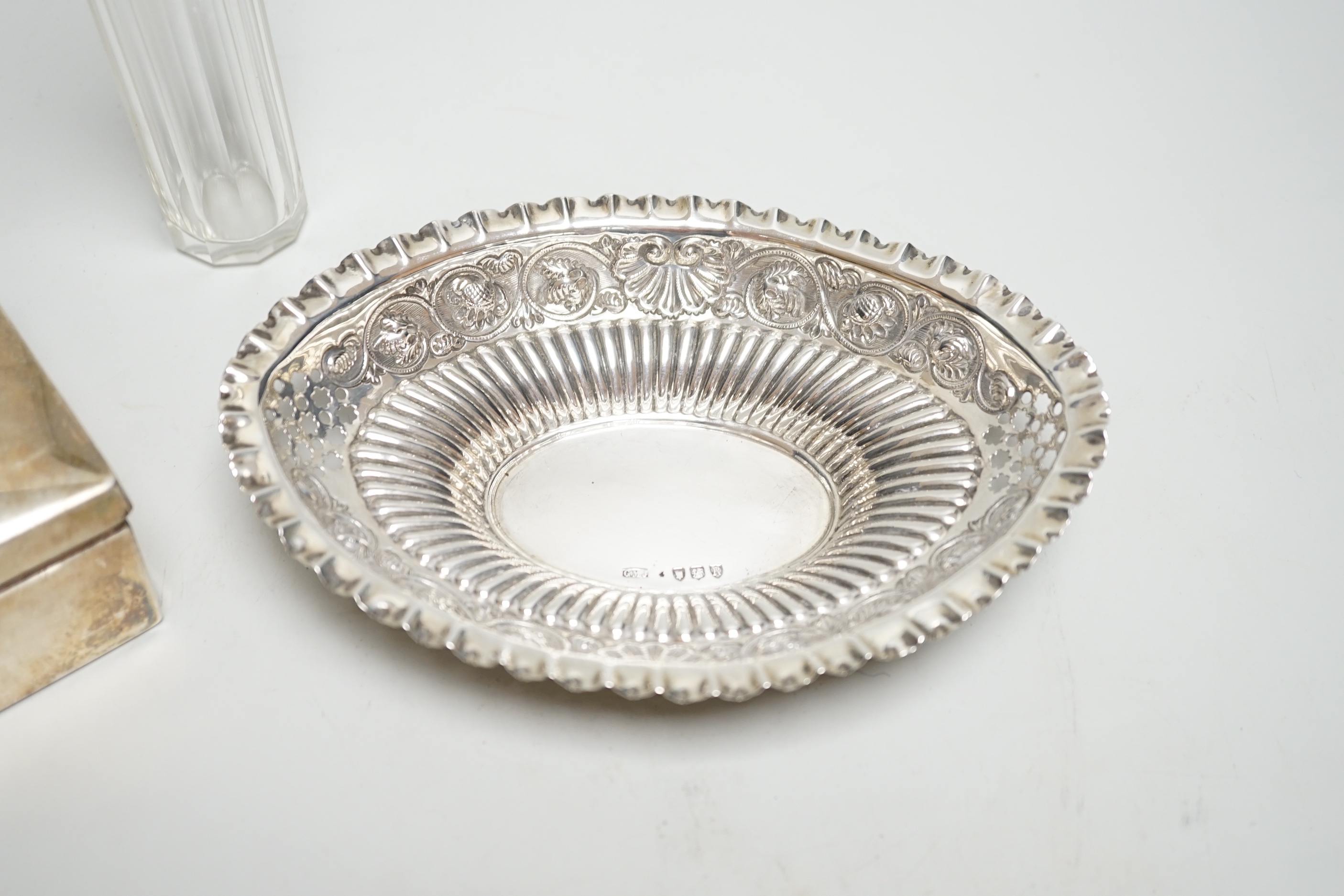 A late Victorian silver mounted cigarette box, London, 1889, 10.5cm a pierced silver dish and a mounted glass toilet jar.
